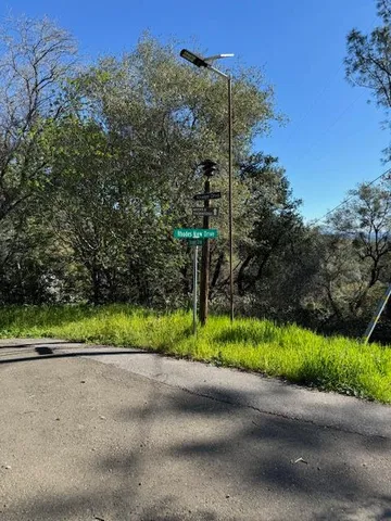 a view of a yard with an outdoor space
