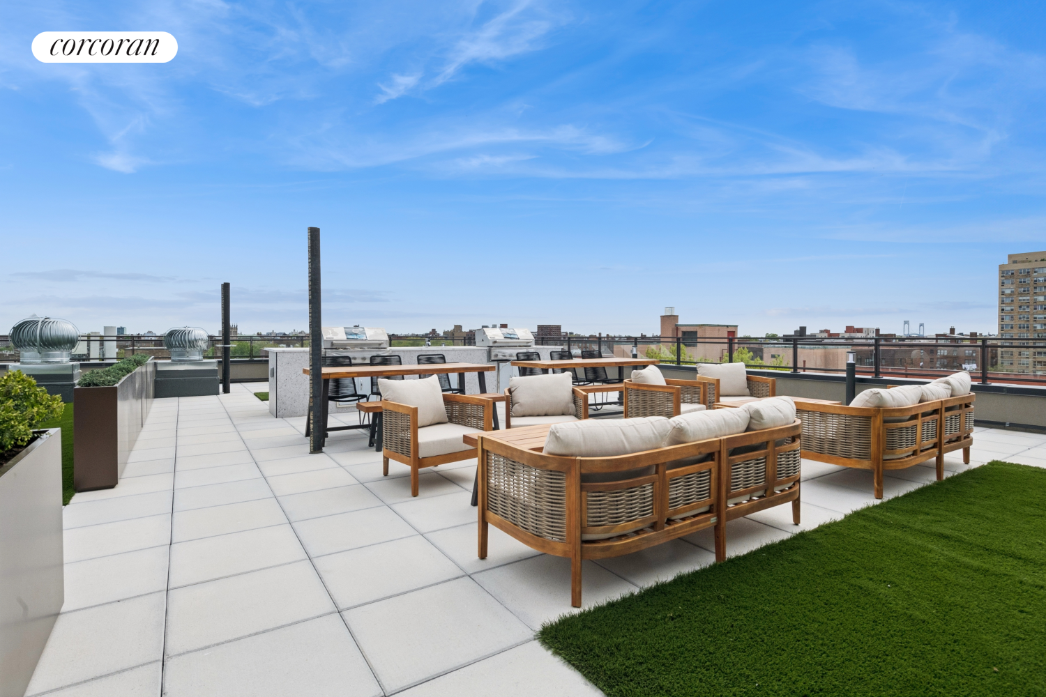 428 East 9th Street, Unit 703 Brooklyn, NY 11218 - Photo 9 of 24 a view of a terrace with lawn chairs