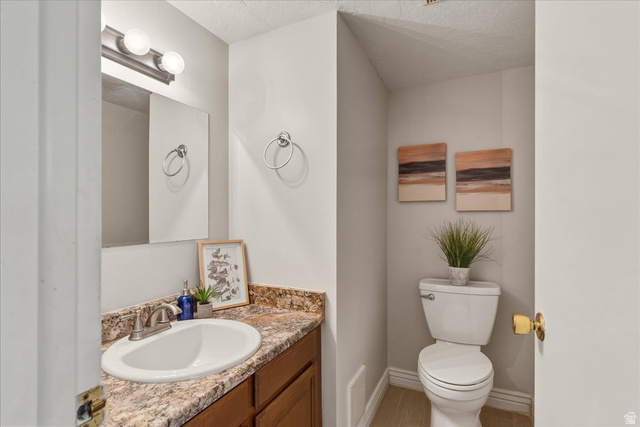 947 Canyon Road, Unit 29 Ogden, UT 84404 - Photo 17 of 19 Bathroom with vanity and toilet