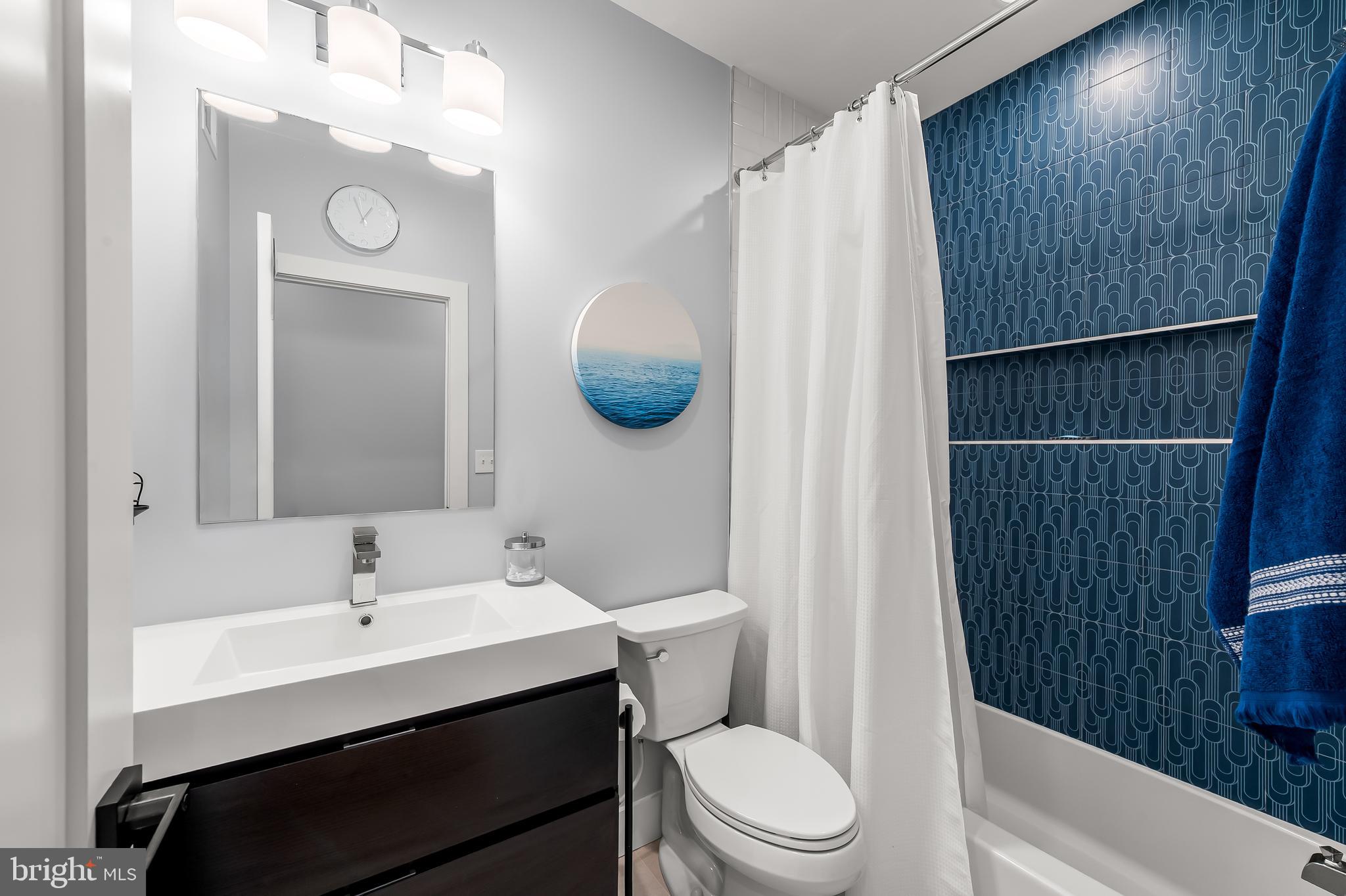 710 Baylis Street Baltimore, MD 21224 - Photo 22 of 46 Second Floor Hallway Full Bath with Tub