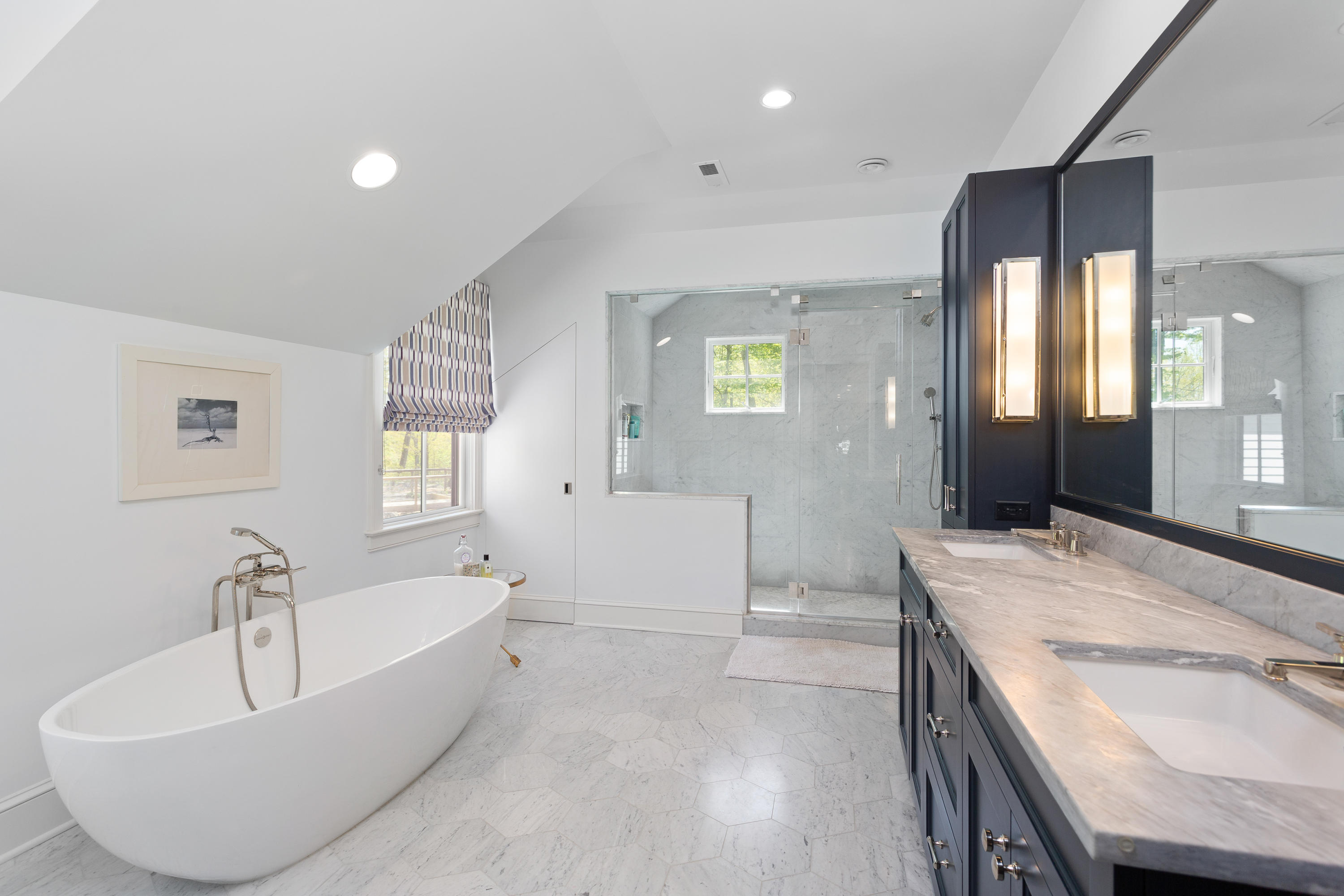 9 Canoe Trail Darien, CT 06820 - Photo 13 of 28 a spacious bathroom with a tub sink and mirror