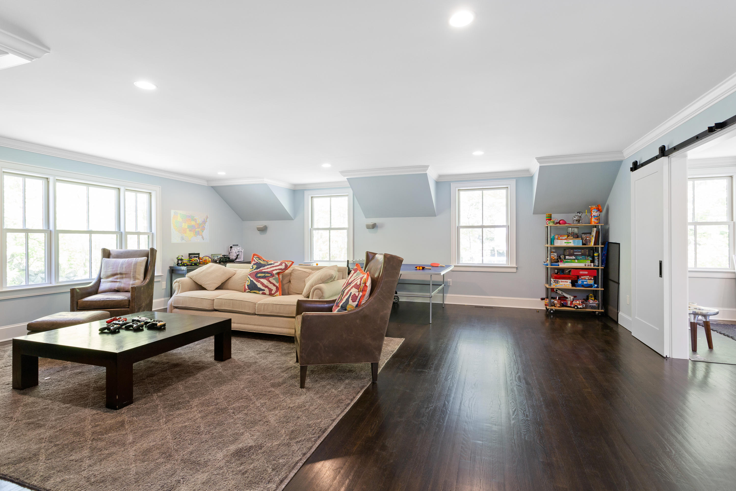 9 Canoe Trail Darien, CT 06820 - Photo 16 of 28 a living room with furniture and a wooden floor