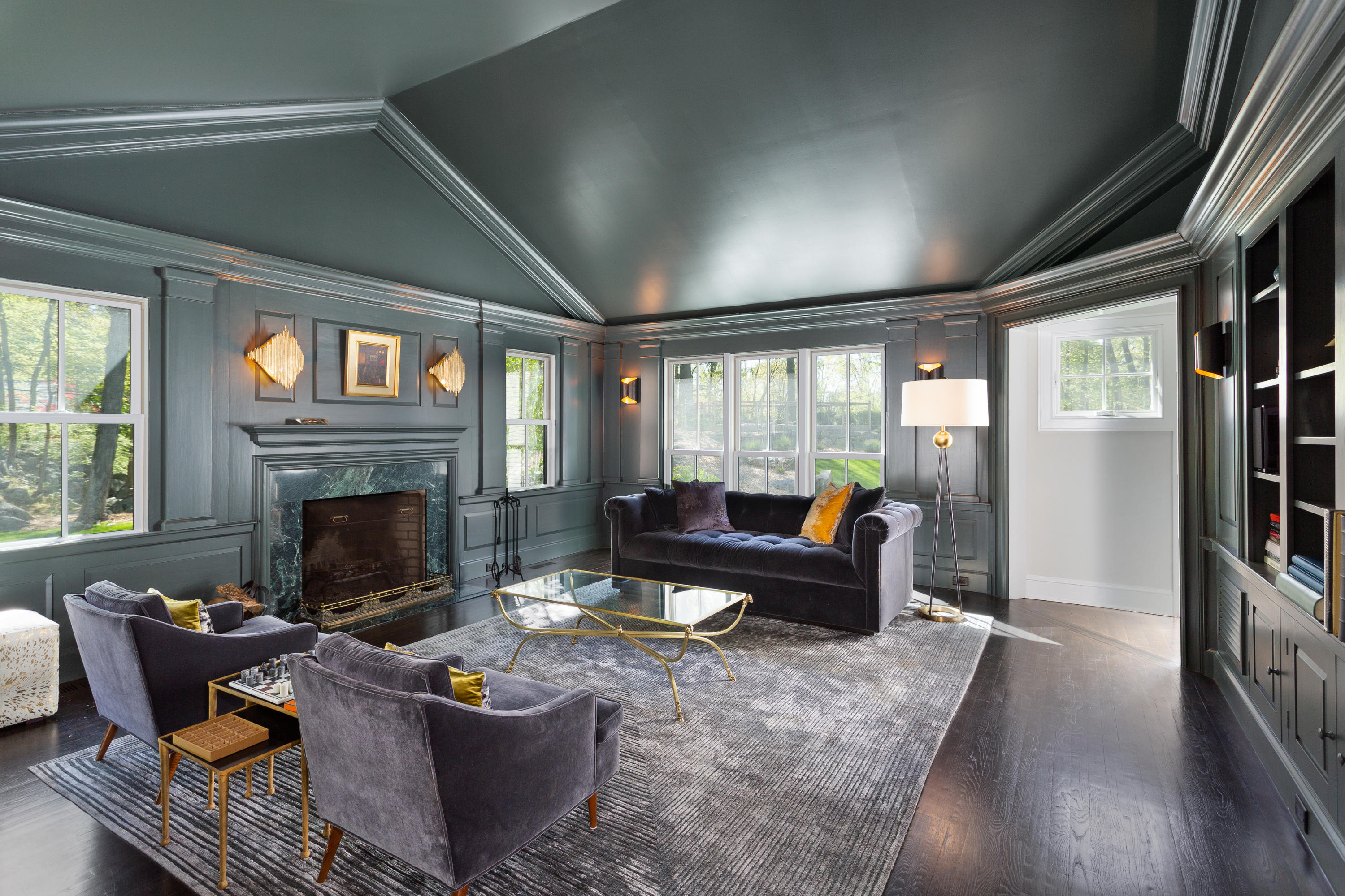 9 Canoe Trail Darien, CT 06820 - Photo 10 of 28 a living room with furniture and a fireplace