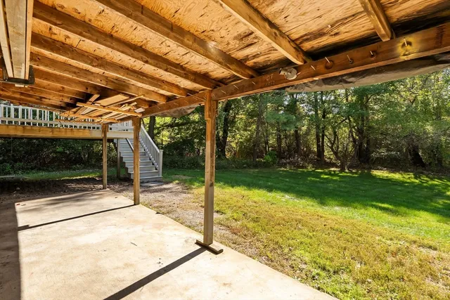 a view of a backyard with a small cabin