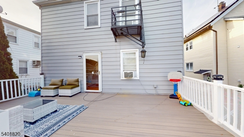 40 Howard Street, Unit 1 Bloomfield, NJ 07003 - Photo 19 of 21 a view of a chair with a couch