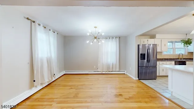a view of a kitchen with a sink