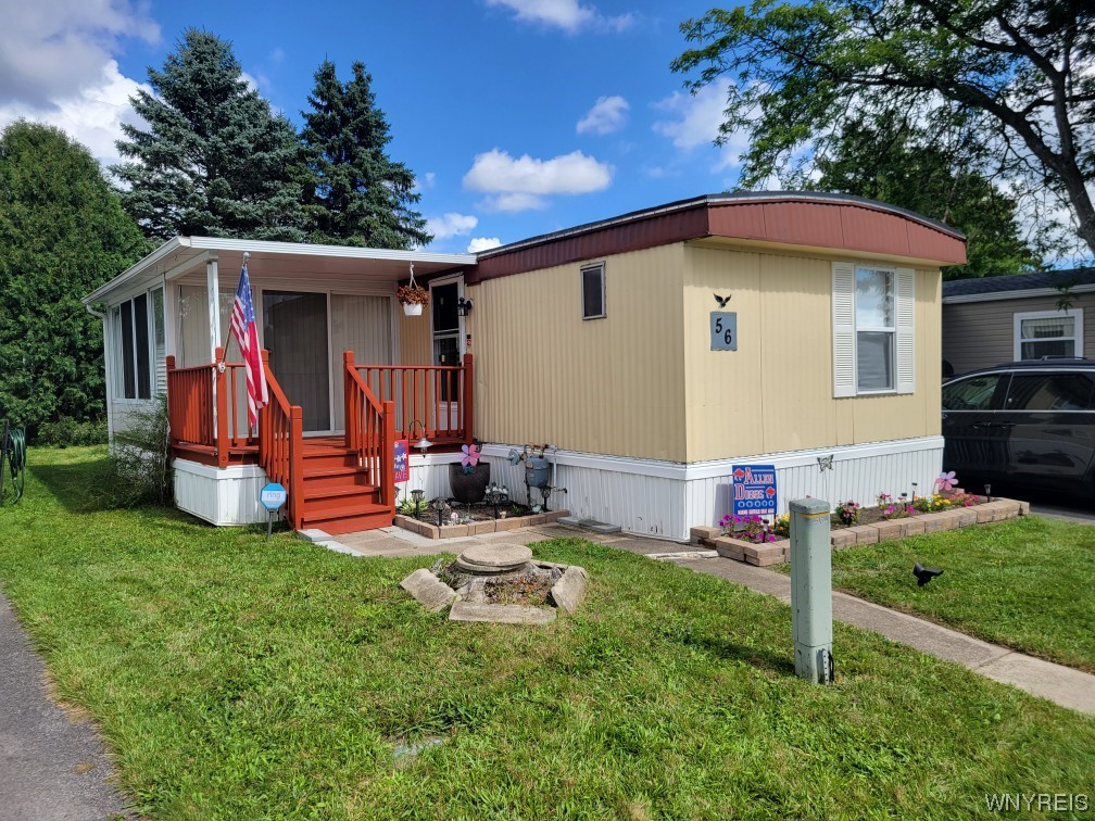 CONCRETE SIDE WALKS TO COVERED DECK