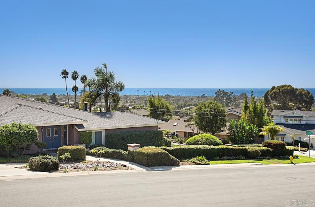 3324 Ridgecrest Drive Carlsbad, CA 92008 - Photo 1 of 1 a terrace with outdoor seating and city view