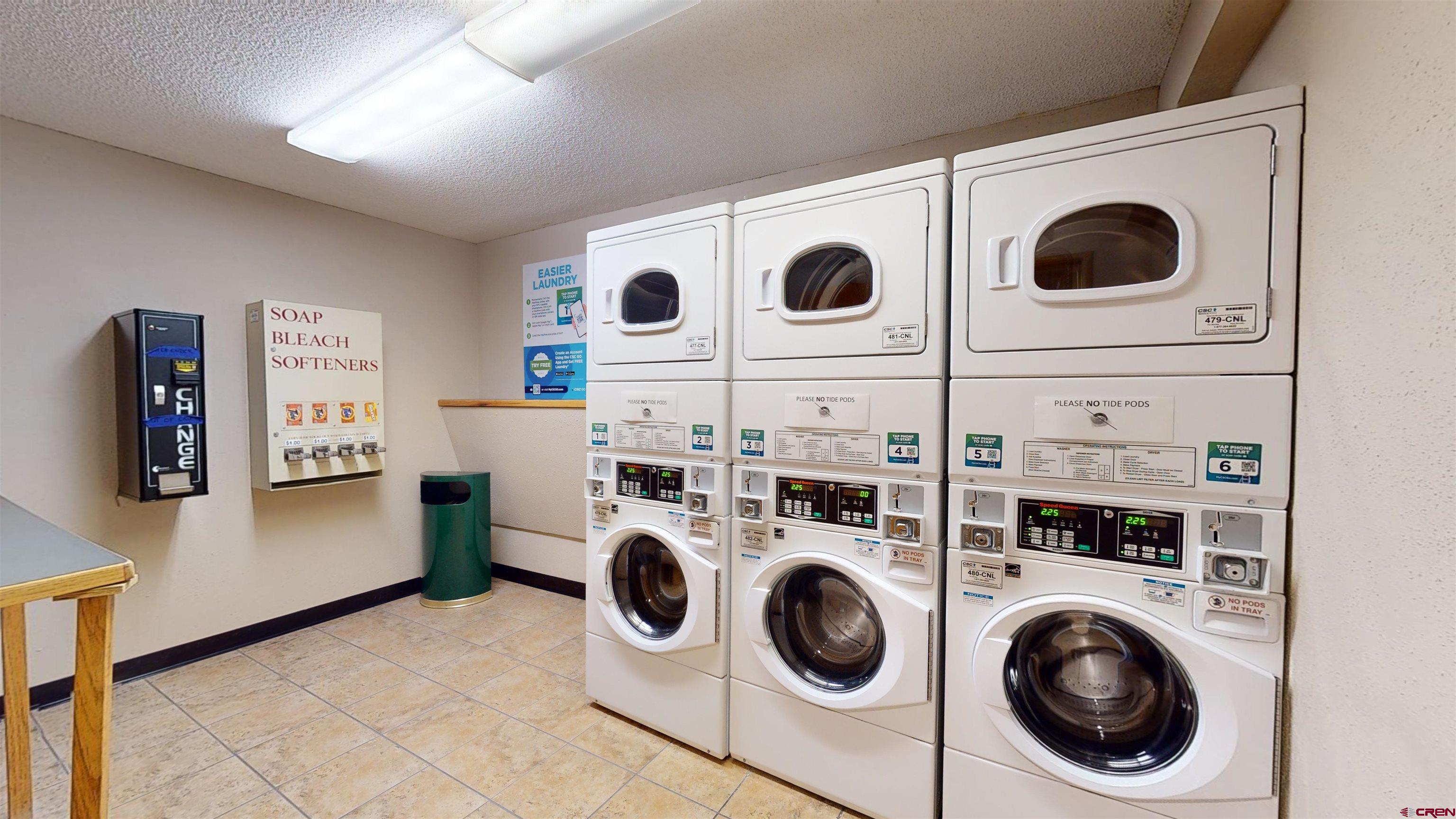 6 Emmons Road, Unit 317 Crested Butte, CO 81225 - Photo 14 of 19 a utility room with dryer and washer