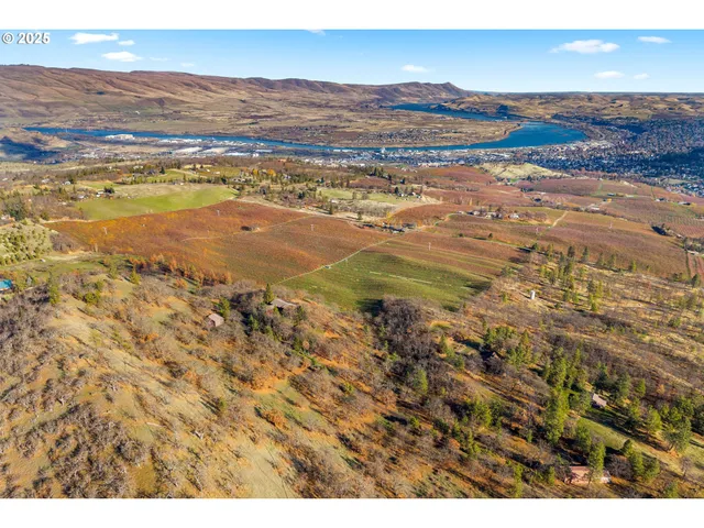 a view of an ocean and a mountain