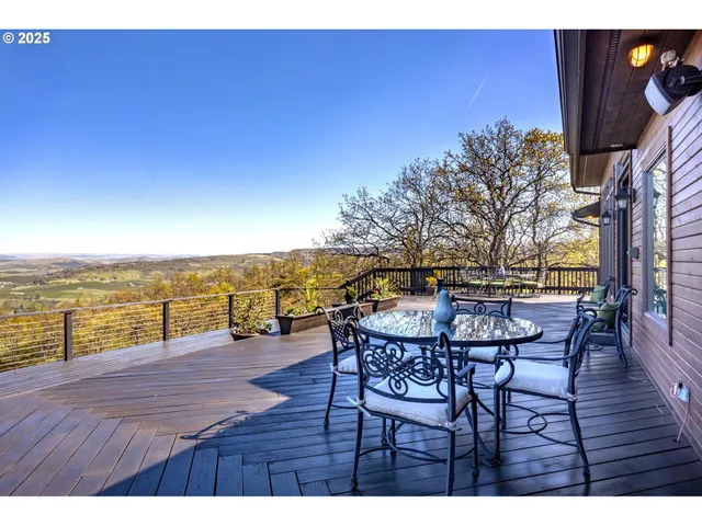 a view of a chairs and table on the terrace