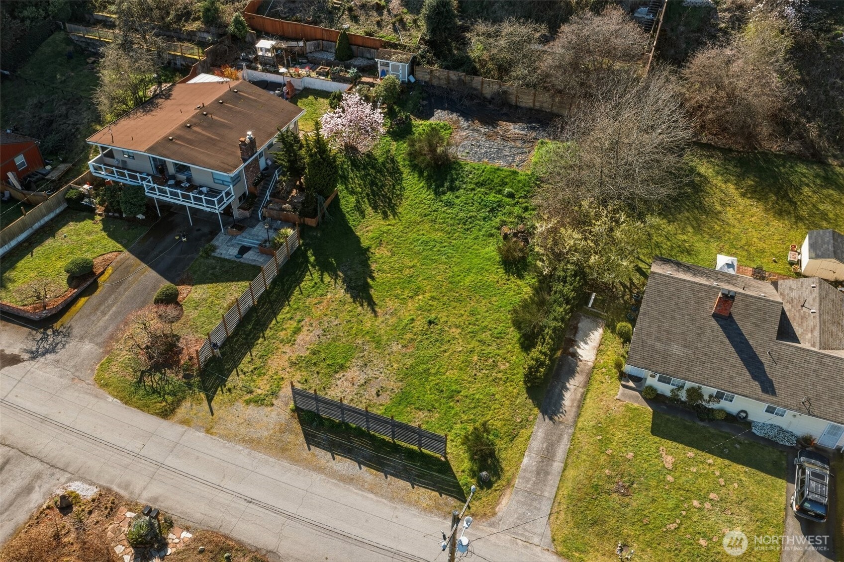 9017 3rd Avenue Southwest Seattle, WA 98106 - Photo 5 of 12 an aerial view of a residential houses with yard