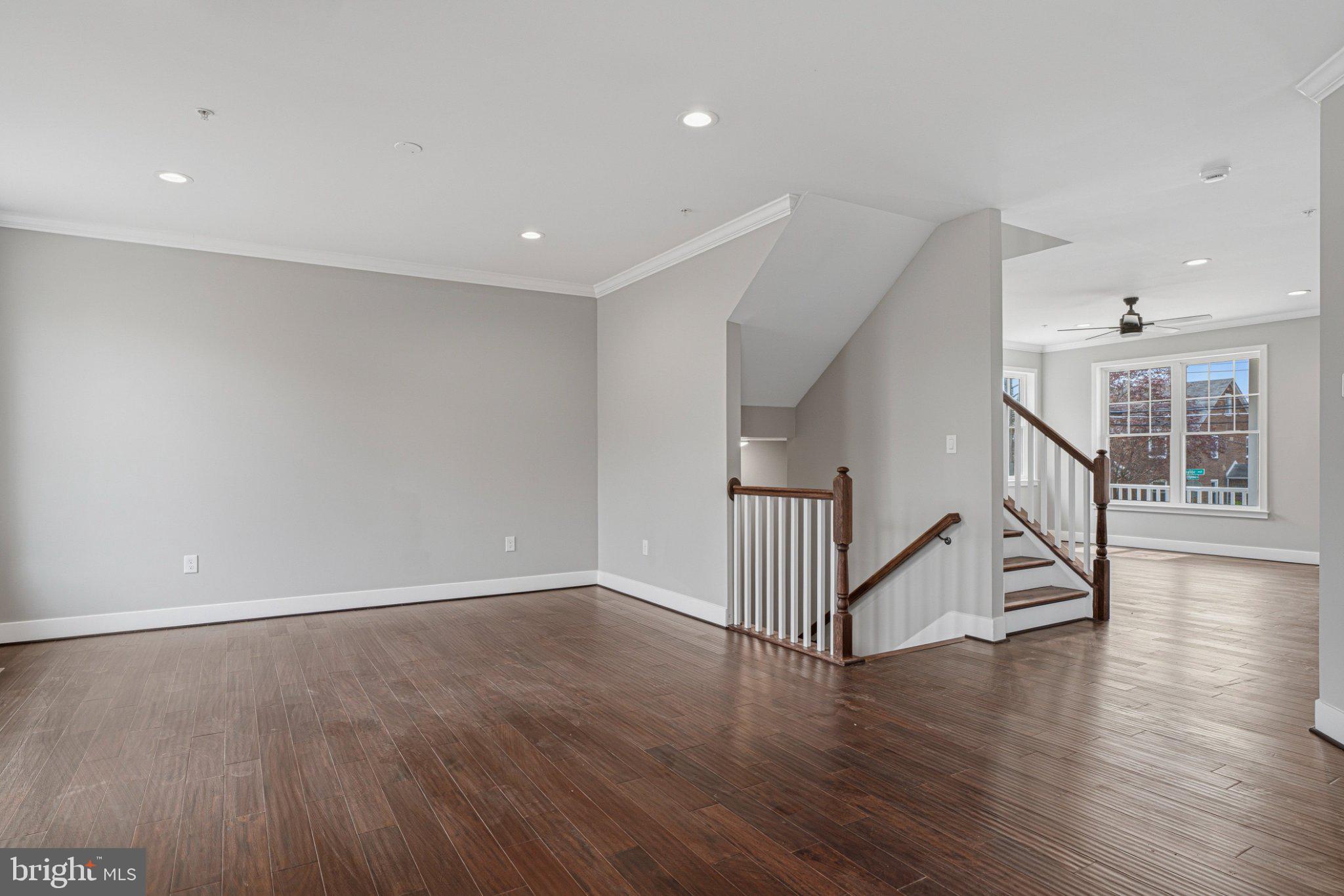 4100 Taylor Avenue Baltimore, MD 21236 - Photo 12 of 57 a view of a room with wooden floors and stairs