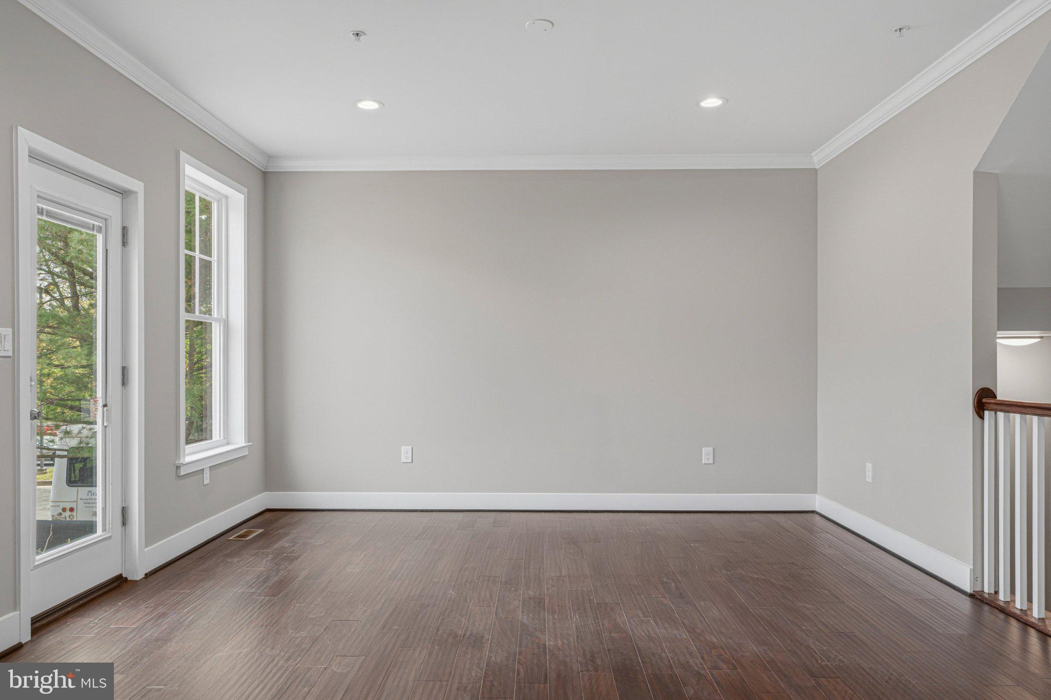 4100 Taylor Avenue Baltimore, MD 21236 - Photo 13 of 57 wooden floor in an empty room with a window