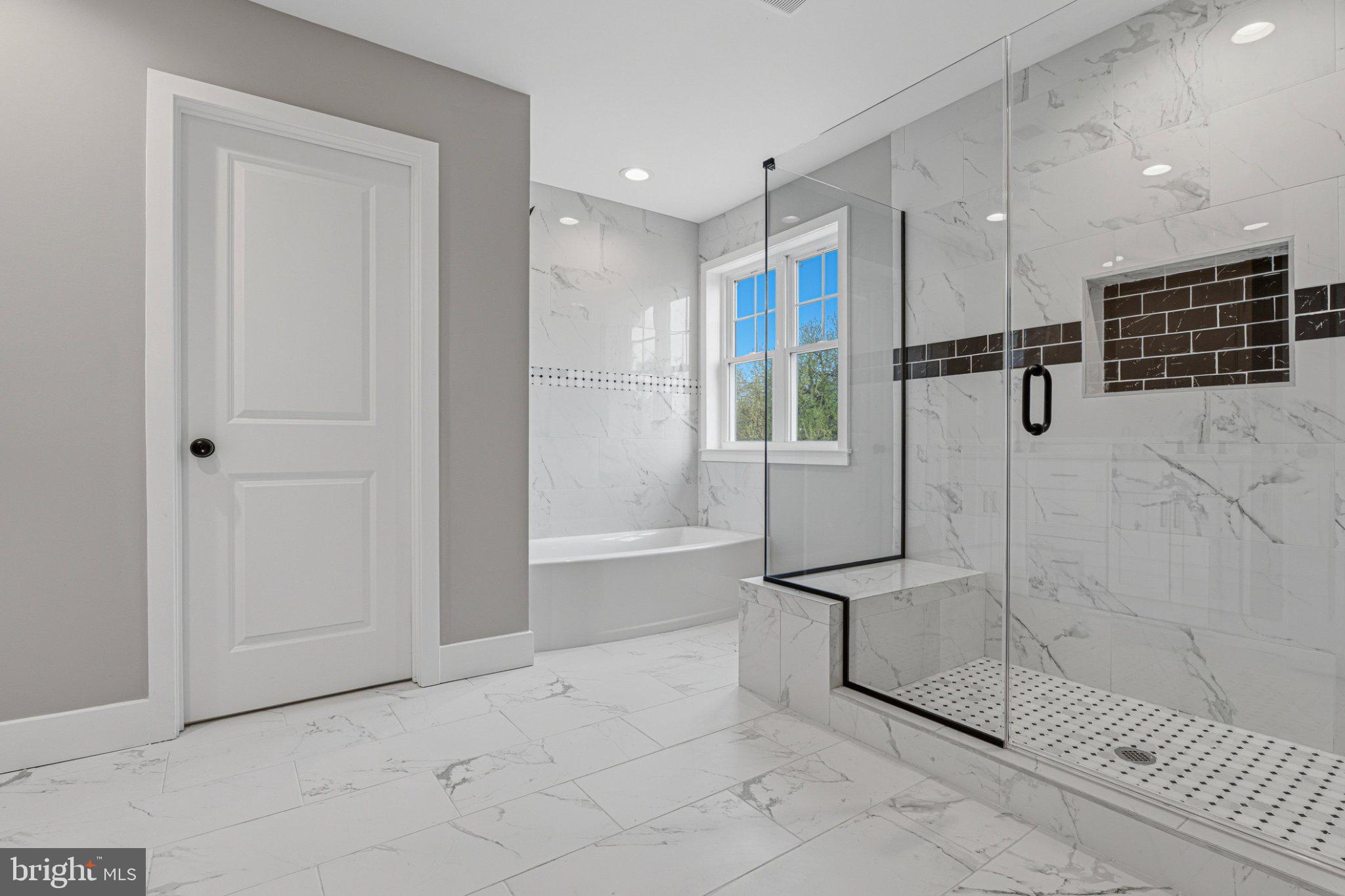 4100 Taylor Avenue Baltimore, MD 21236 - Photo 27 of 57 Elegant marble bath with modern accents.