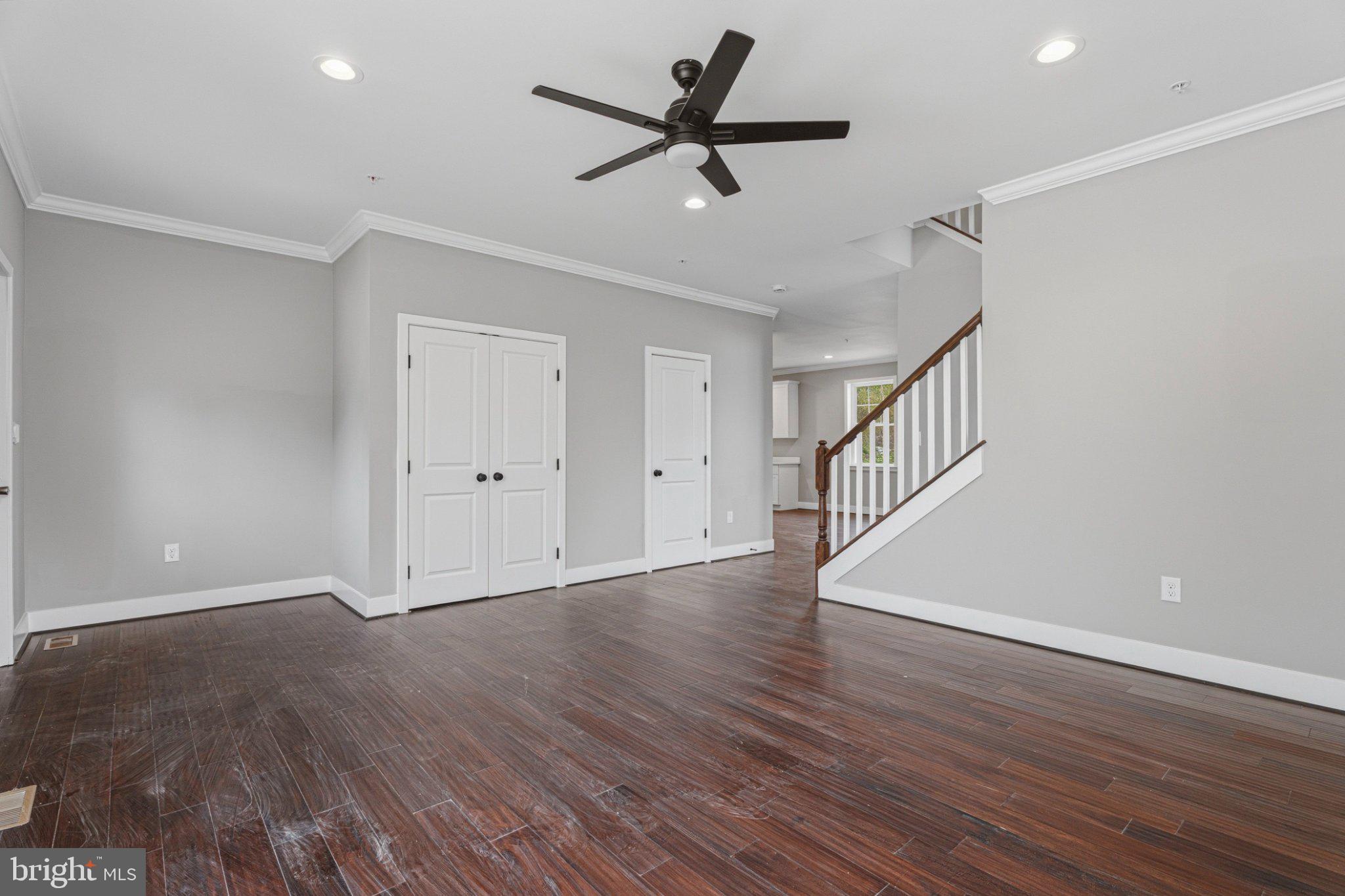 4100 Taylor Avenue Baltimore, MD 21236 - Photo 3 of 57 a view of an empty room with a window and wooden floor