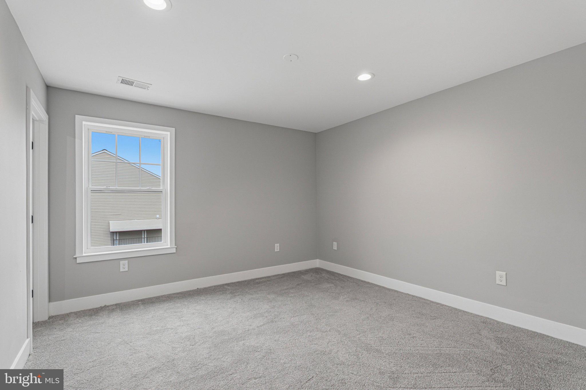 4100 Taylor Avenue Baltimore, MD 21236 - Photo 44 of 57 an empty room with a window