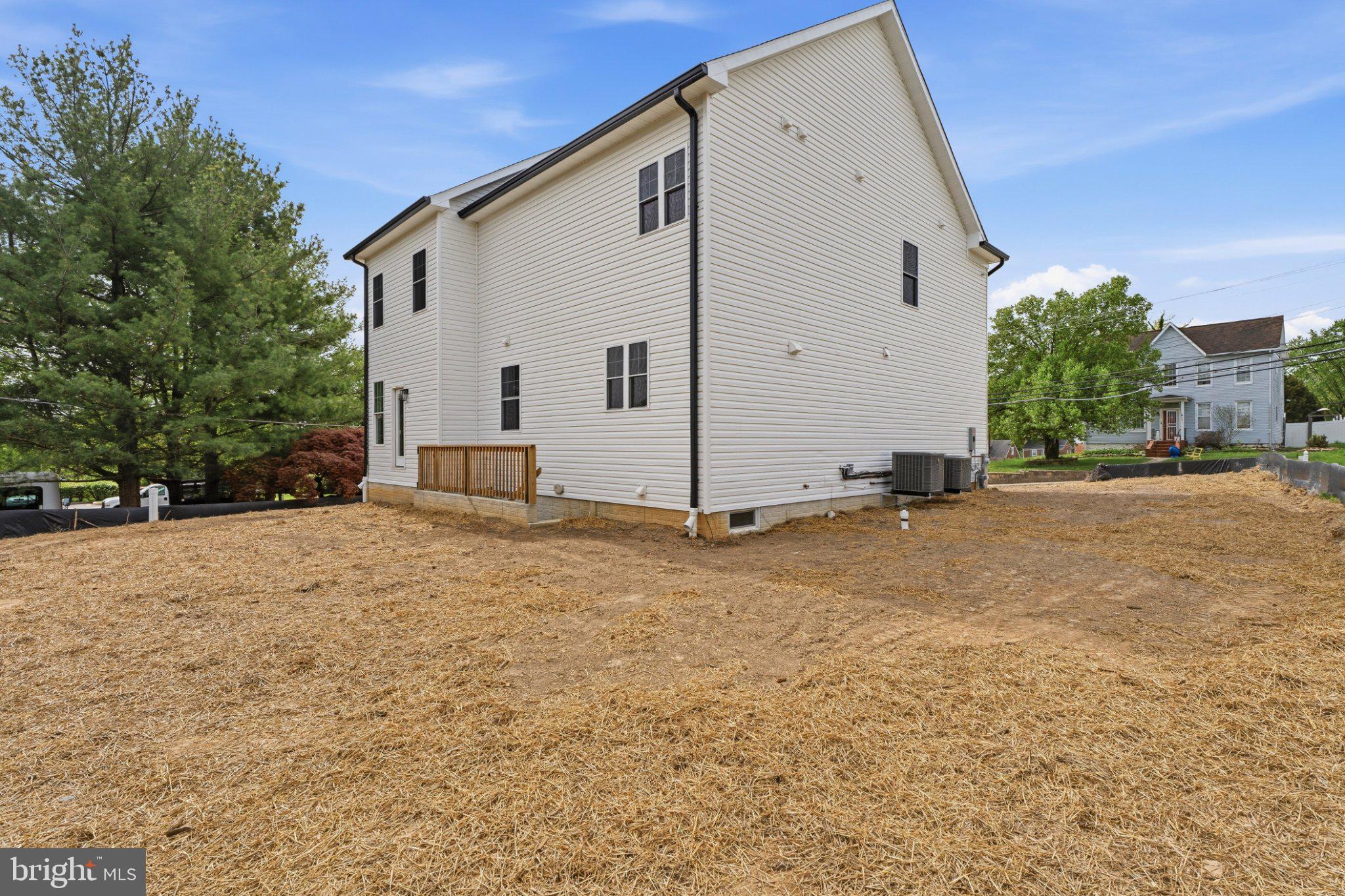 4100 Taylor Avenue Baltimore, MD 21236 - Photo 56 of 57 a view of a house with backyard and trees