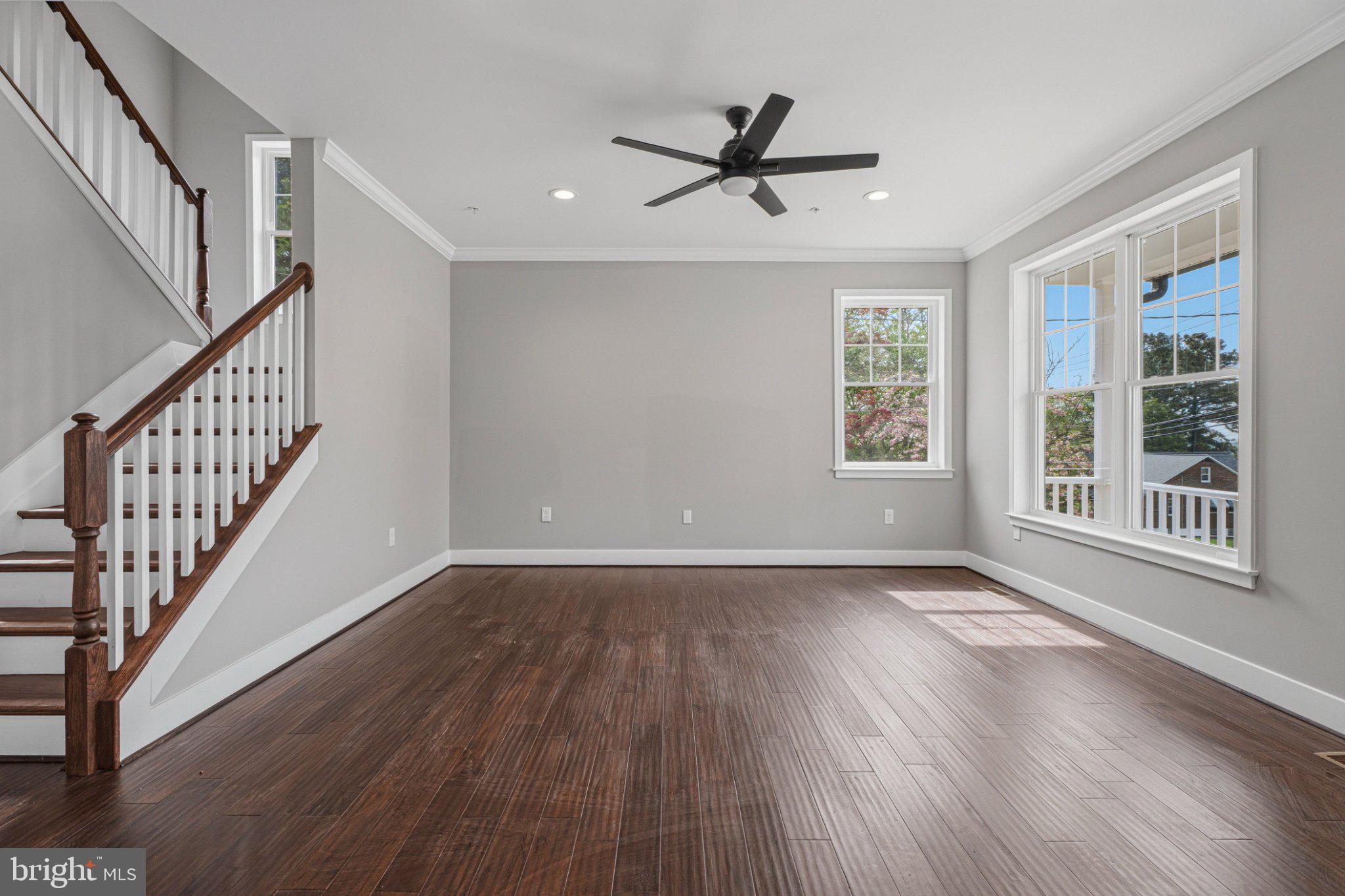 4100 Taylor Avenue Baltimore, MD 21236 - Photo 6 of 57 a view of an empty room with wooden floor and a window
