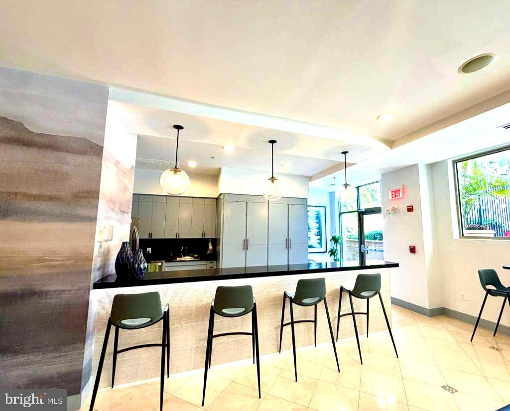 12001 Market Street, Unit 177 Reston, VA 20190 - Photo 38 of 63 Community Room Kitchenette