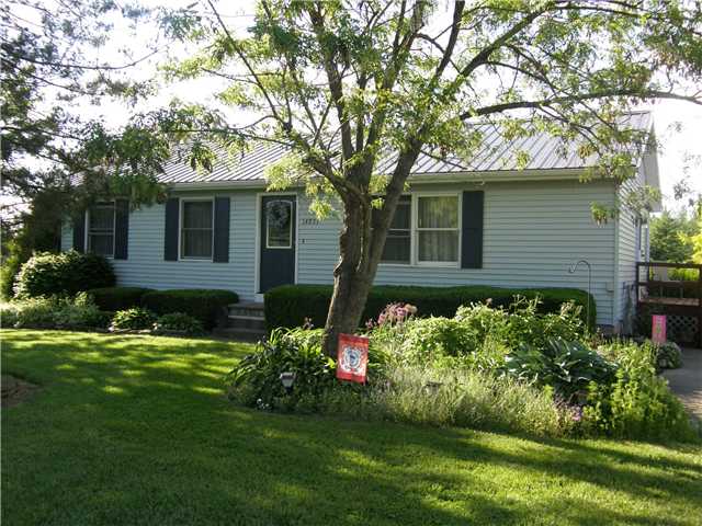 14833 East County House Road Albion, NY 14411 - Photo 1 of 1 Exterior Front. Plenty of shade around the house.