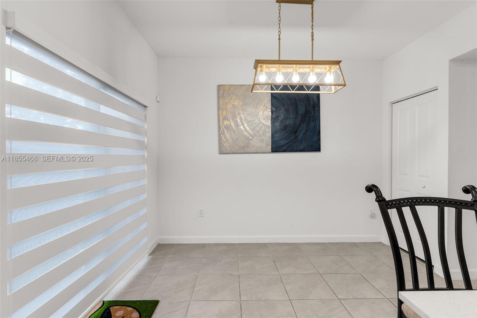 13315 Southwest 285th Street Homestead, FL 33033 - Photo 18 of 31 a view of a hallway with front door