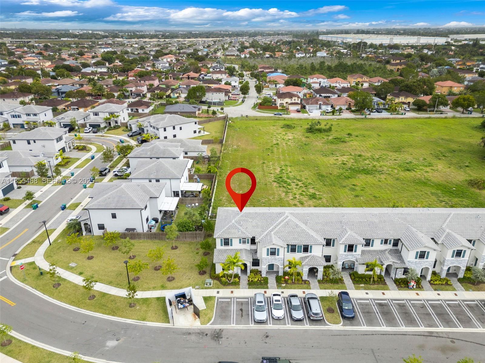 13315 Southwest 285th Street Homestead, FL 33033 - Photo 24 of 31 an aerial view of residential houses with outdoor space