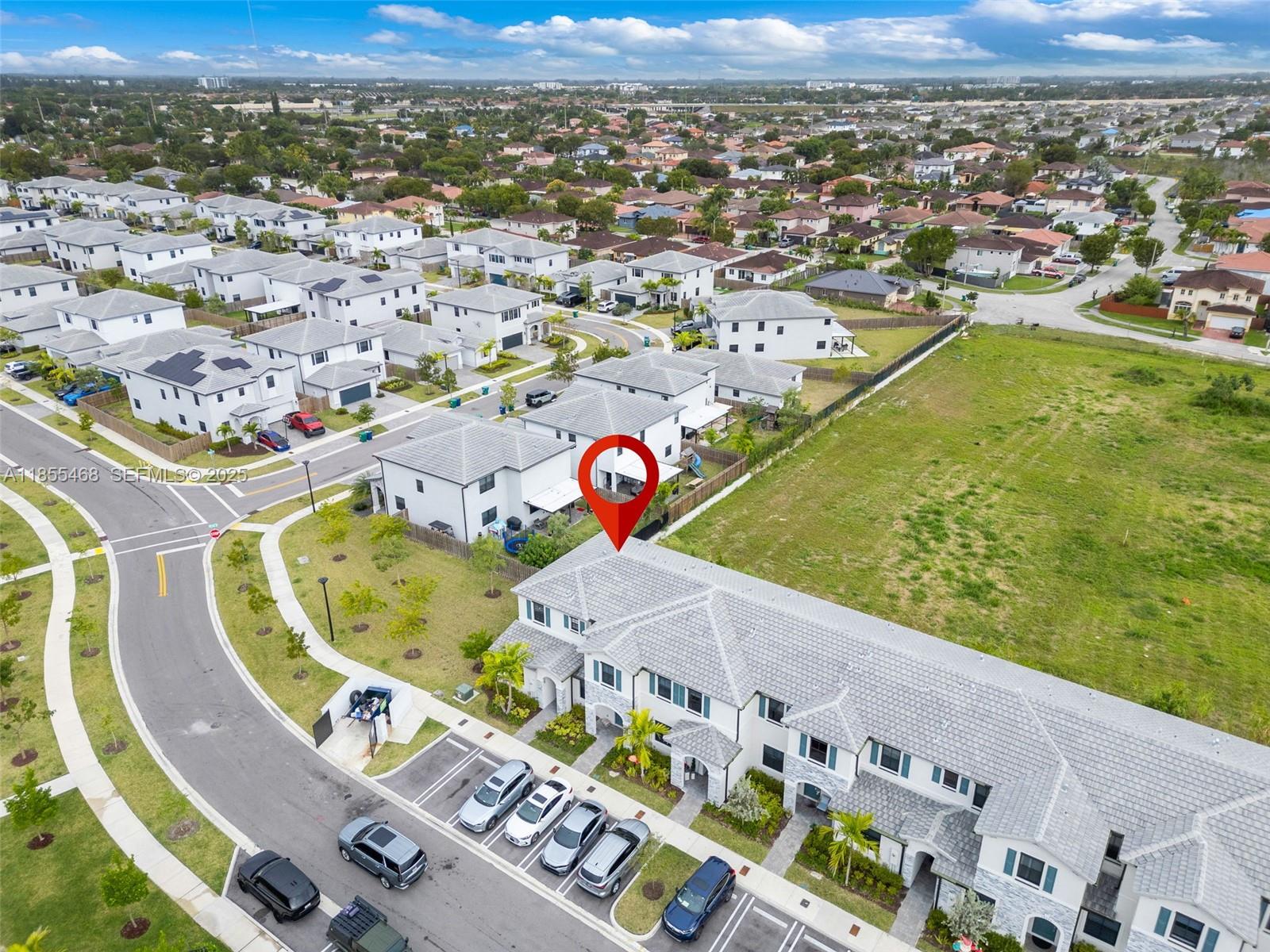 13315 Southwest 285th Street Homestead, FL 33033 - Photo 25 of 31 an aerial view of a swimming pool with a mountain