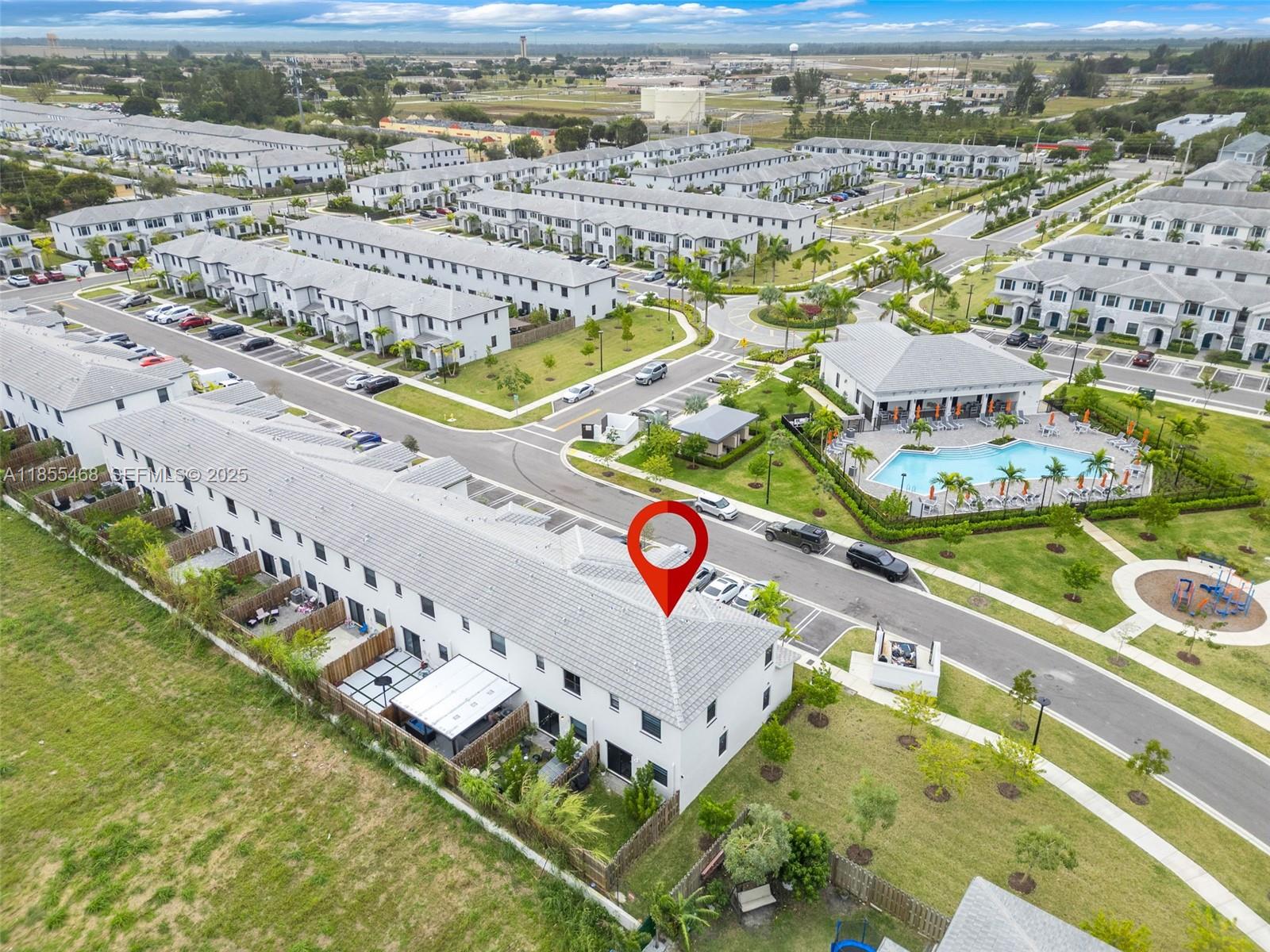 13315 Southwest 285th Street Homestead, FL 33033 - Photo 27 of 31 an aerial view of a city