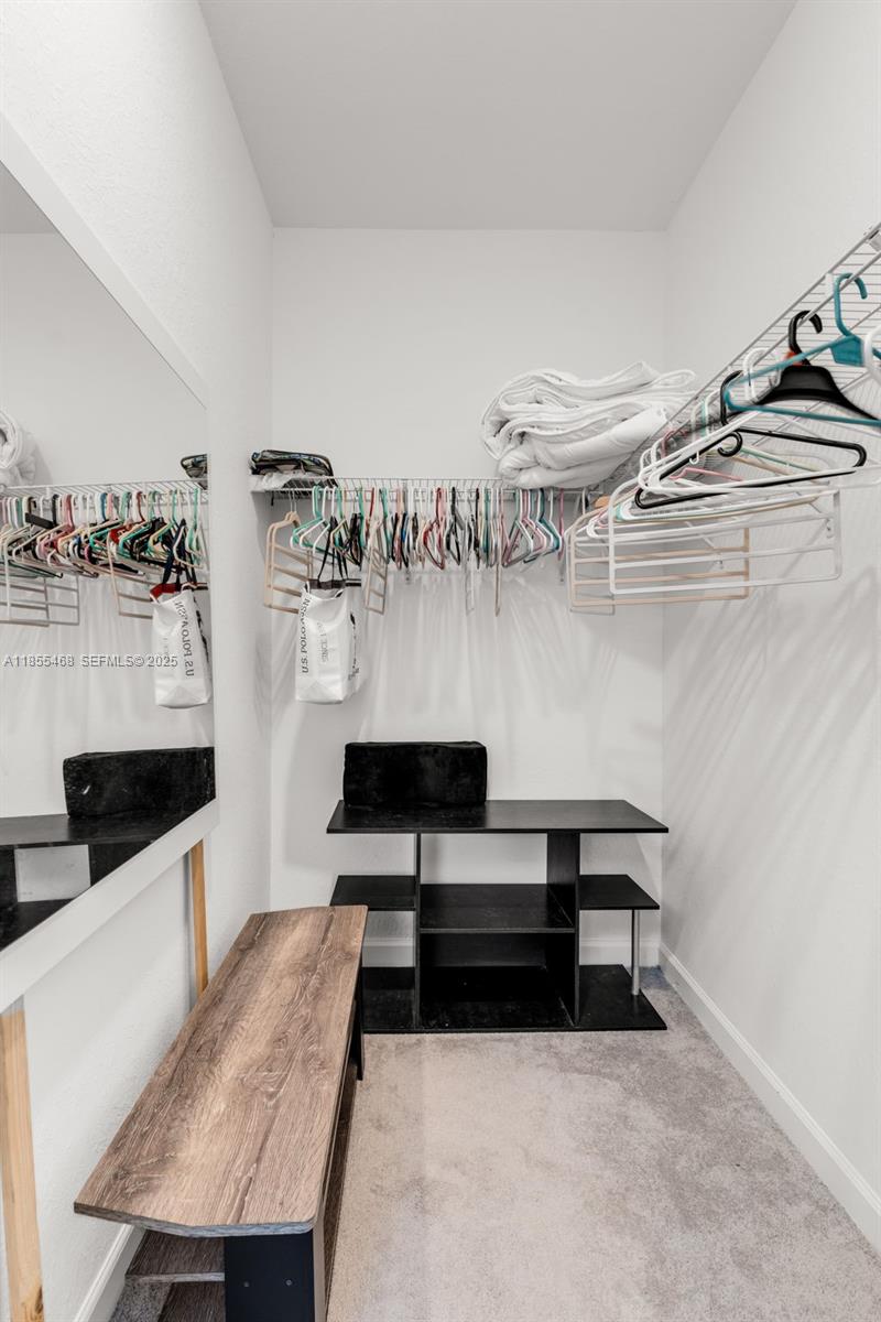 13315 Southwest 285th Street Homestead, FL 33033 - Photo 7 of 31 a living room with lots of furniture and a wooden floor