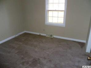 13936 Shopton Road West Charlotte, NC 28278 - Photo 6 of 16 an empty room with a window