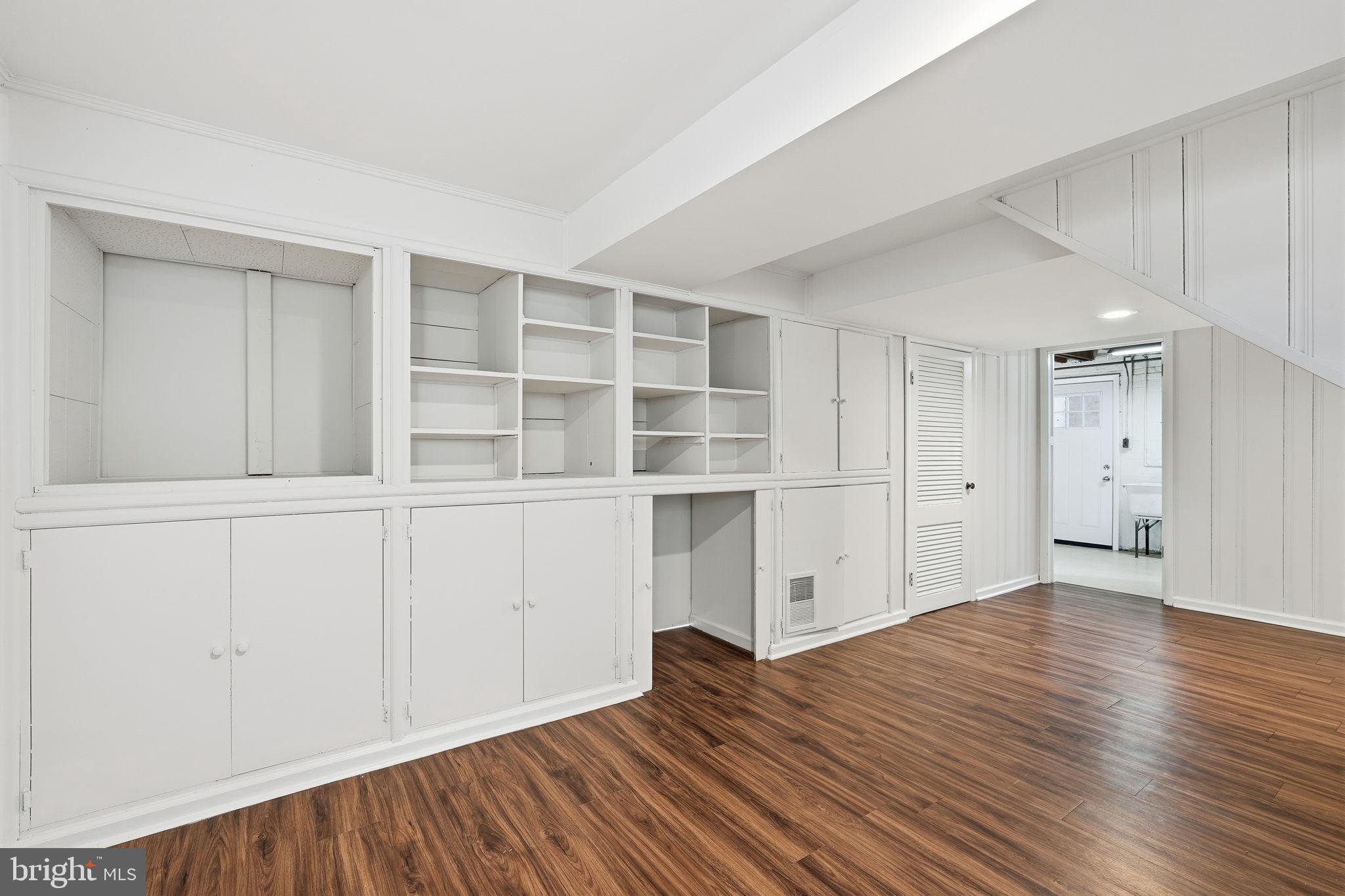 9708 Dameron Drive Silver Spring, MD 20910 - Photo 28 of 38 a view of an empty room with wooden floor and closet