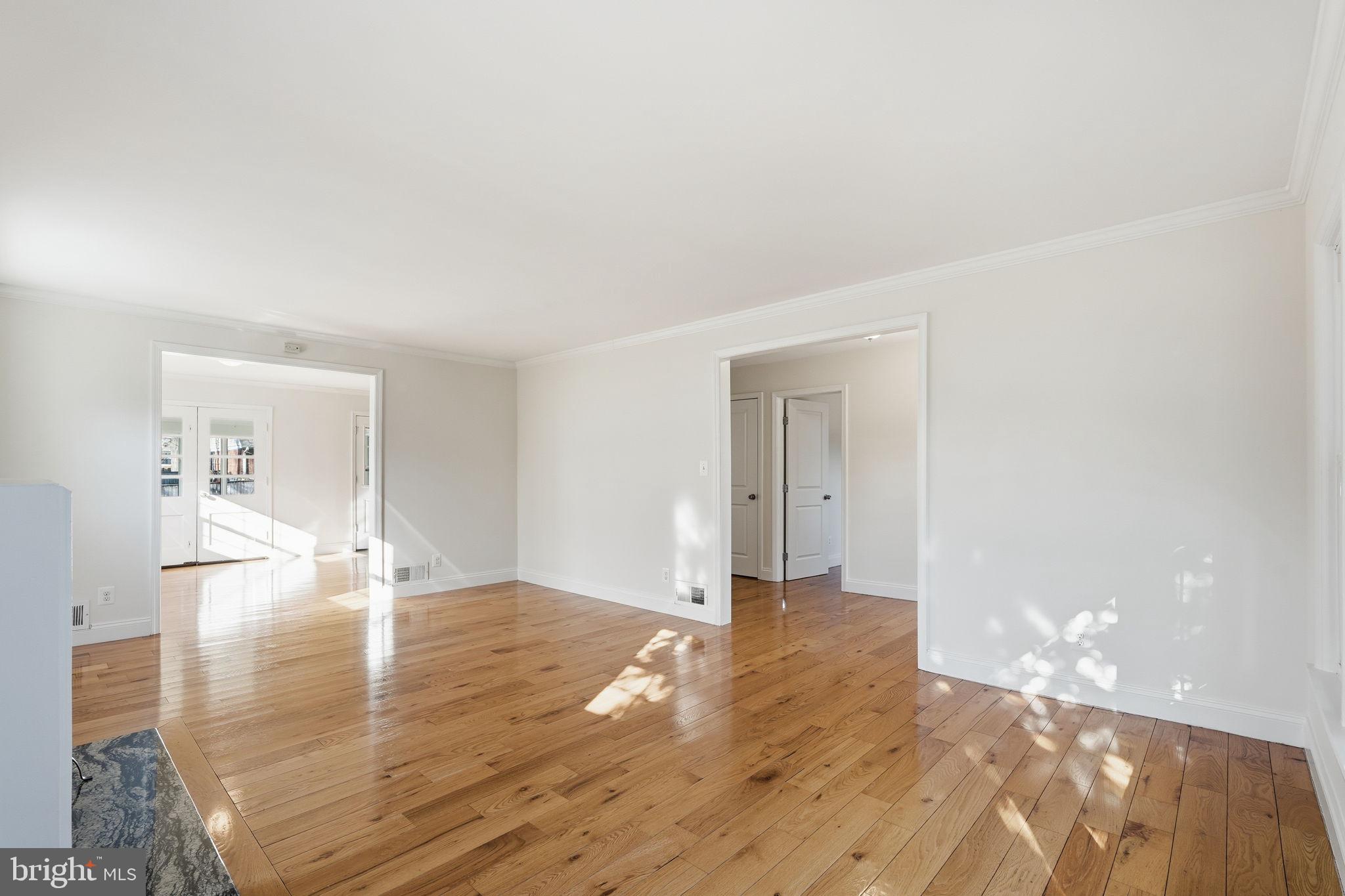 9708 Dameron Drive Silver Spring, MD 20910 - Photo 3 of 38 a view of empty room with wooden floor