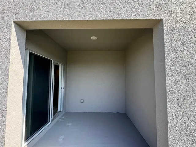 wooden floor and cabinet in an empty room