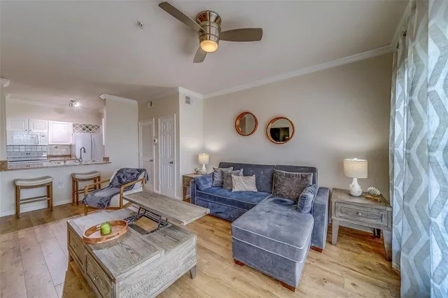 a living room with furniture and a table