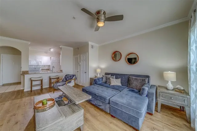 a living room with furniture and a table
