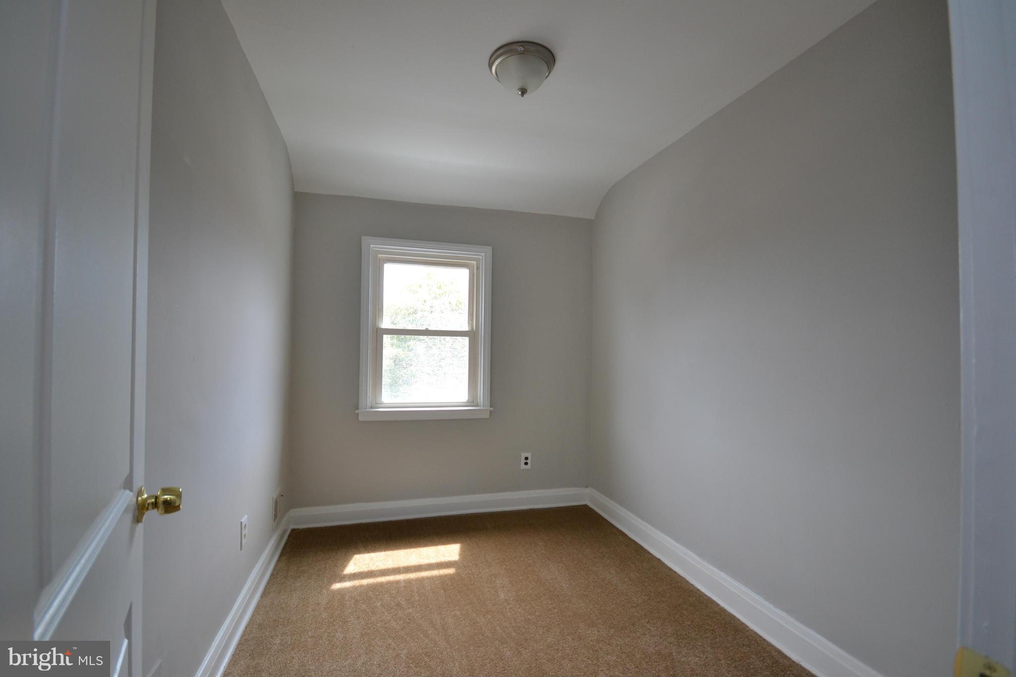 8635 Rock Oak Road Baltimore, MD 21234 - Photo 14 of 29 an empty room with a window