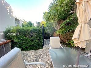 8926 Emerson Avenue Surfside, FL 33154 - Photo 2 of 18 view of a back yard of the house