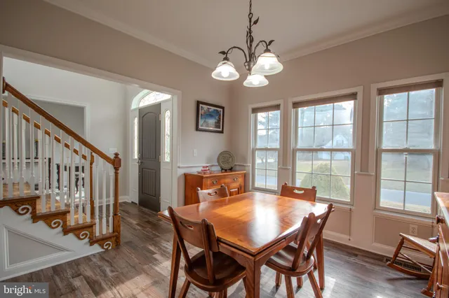 a work room with furniture and windows