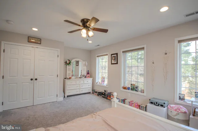 a bathroom with a sink a vanity and a mirror