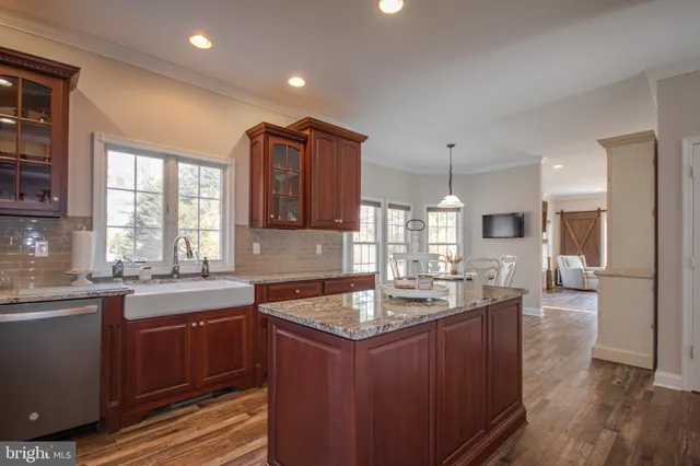 a kitchen with a stove and a sink