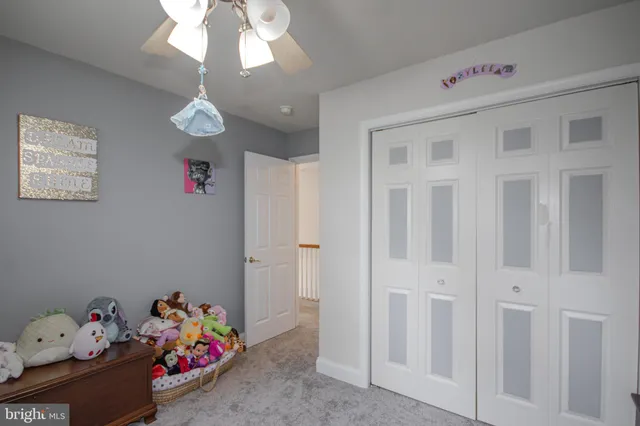 a utility room with two washing machine