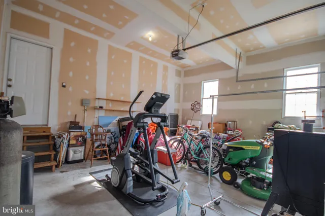 a house with swimming pool in front of it