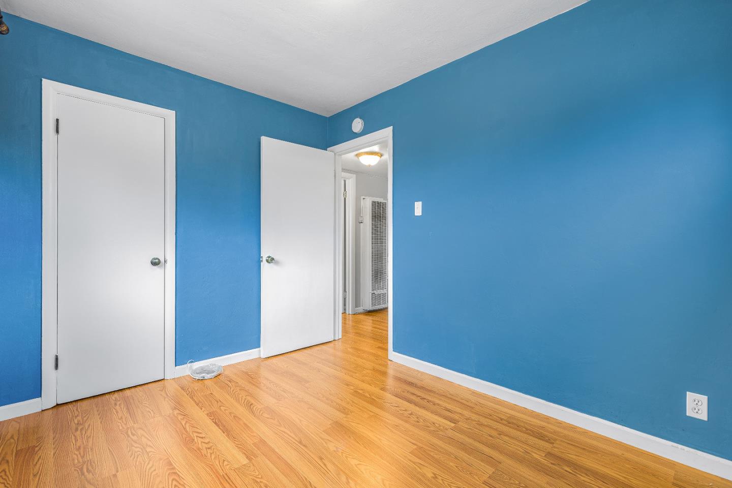 353 Cedar Street Millbrae, CA 94030 - Photo 15 of 19 a view of empty room with wooden floor