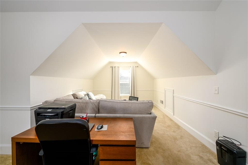 1979 Trinity Mill Drive Dacula, GA 30019 - Photo 22 of 38 a living room with furniture and a window