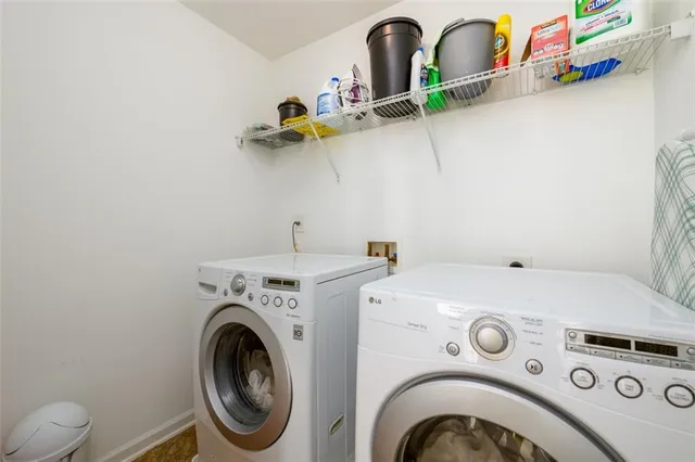 a utility room with dryer and washer