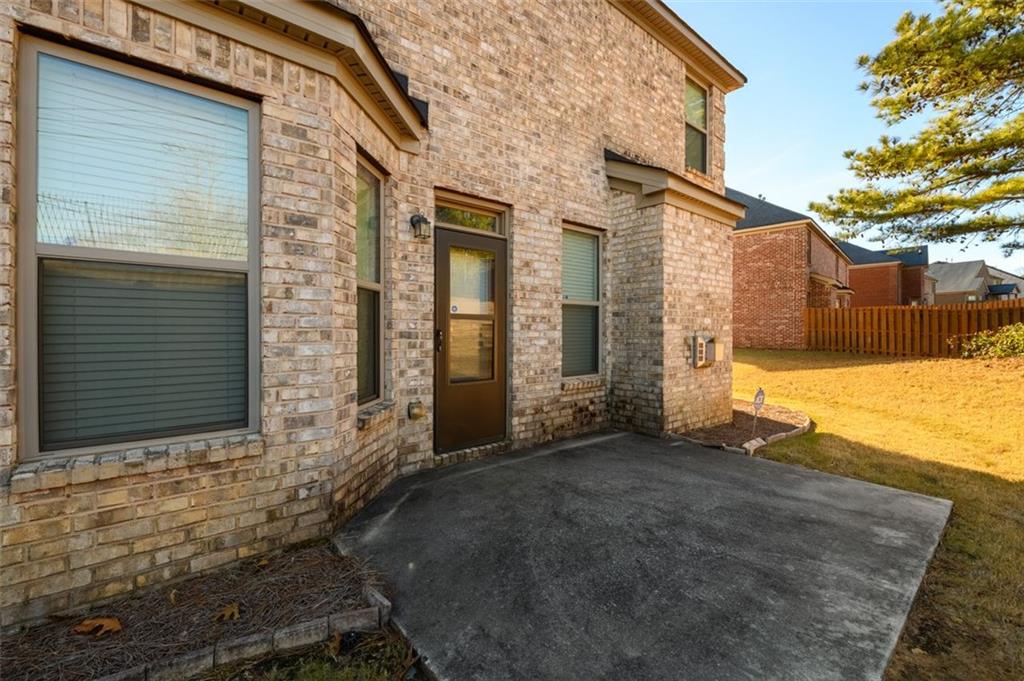 1979 Trinity Mill Drive Dacula, GA 30019 - Photo 33 of 38 a view of a house with backyard and tree