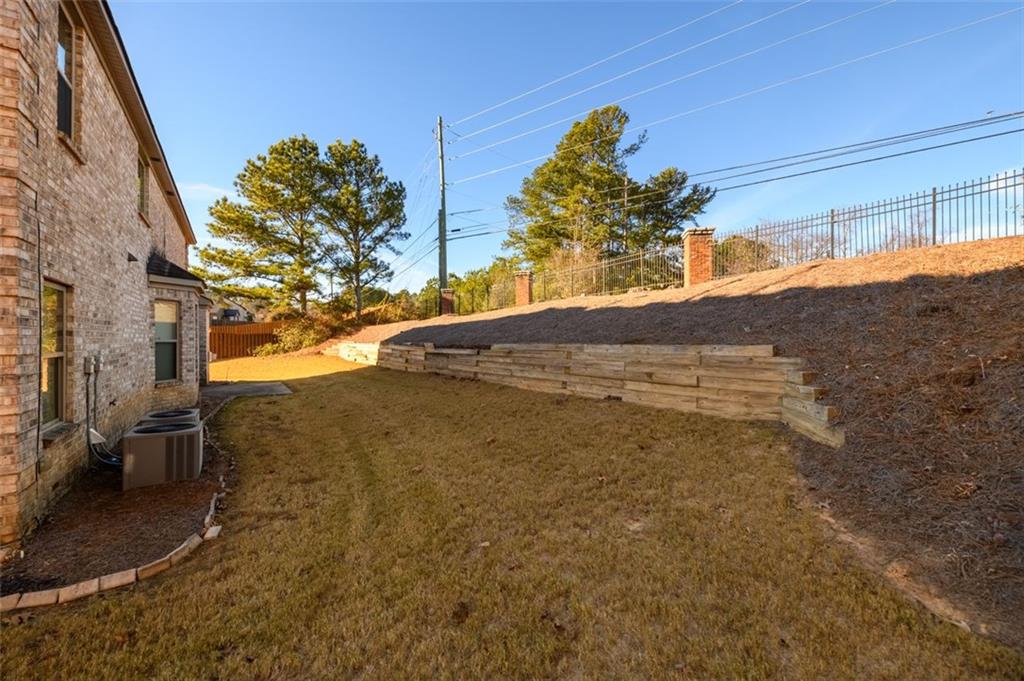 1979 Trinity Mill Drive Dacula, GA 30019 - Photo 36 of 38 a view of a yard