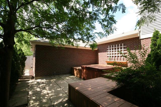 216 Longview Drive Elgin, IL 60124 - Photo 18 of 20 a view of a backyard with sitting area