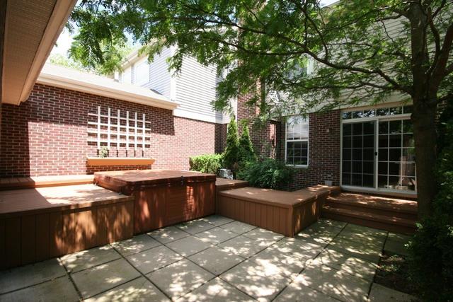 216 Longview Drive Elgin, IL 60124 - Photo 19 of 20 a view of a house with backyard and sitting area